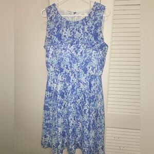 Blue floral ruffle sleevless knee high dress in the size 12